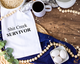 Shit creek survivor Tea Towel